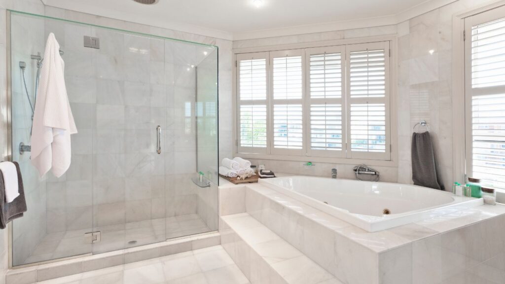 Installing Solid Surface Walls Over Existing Tile - American Bath and Shower